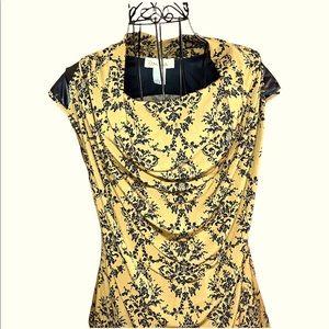 Super cute Small Davina short-sleeved yellow blouse.